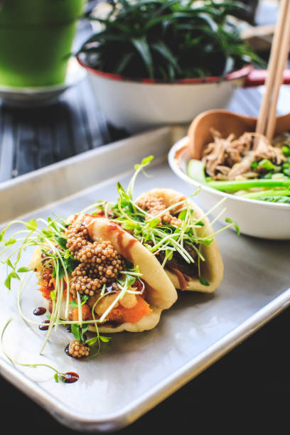 istock Vegan Steamed Bao Buns And Ramen 1166637862