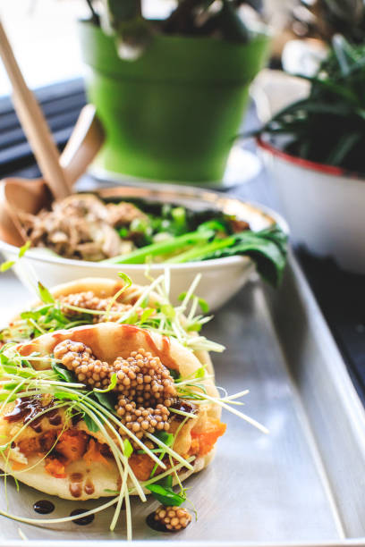 istock Vegan Steamed Bao Buns And Ramen 1166637985