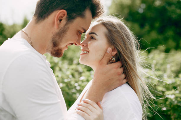 istock Beautiful couple spend time on a summer field 1166639350