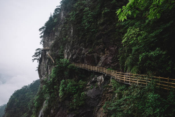 istock Gallery road on cliff on Mingyue Mountain, China 1166639397