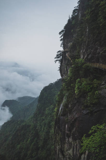 istock Gallery road on cliff on Mingyue Mountain, China 1166639640
