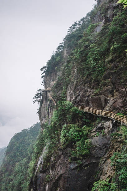 istock Gallery road on cliff on Mingyue Mountain, China 1166639699
