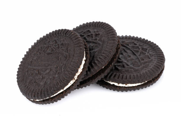 istock sandwich cookies with cream on white background 1166640584