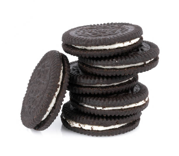istock sandwich cookies with cream on white background 1166642457