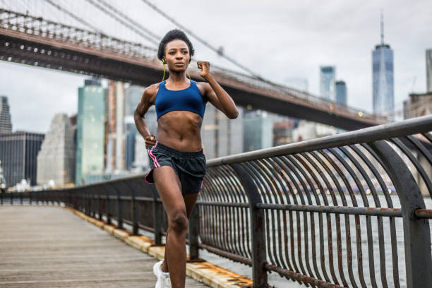 istock Woman running in New York 1166644666