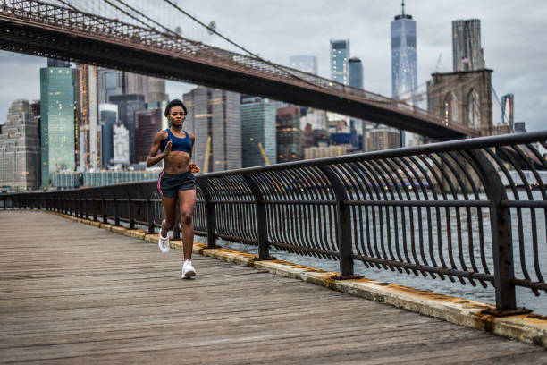 istock Woman running in New York 1166645014