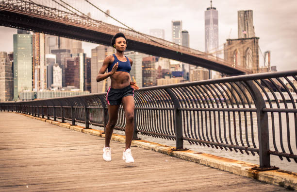 istock Woman running in New York 1166645573