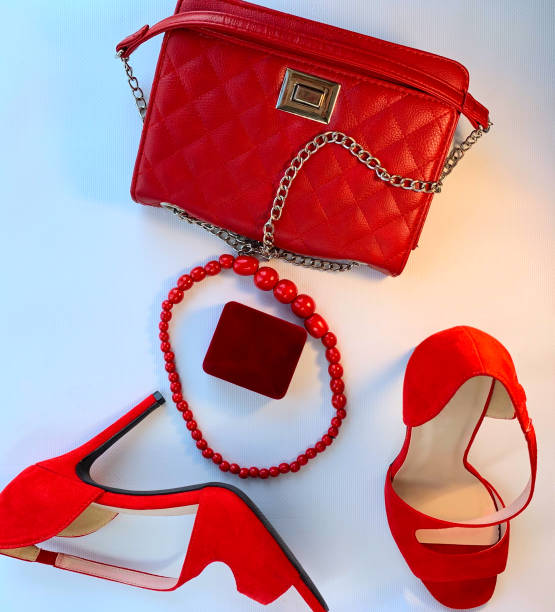istock All red on a white background.A set of red women's accessories. 1166645732