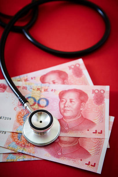 istock Chinese money with stethoscope 1166651158