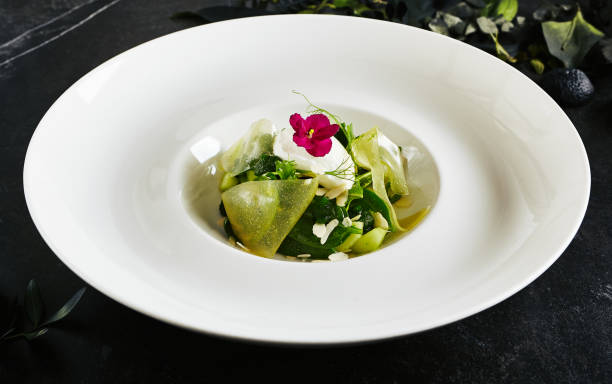 istock Green Salad with Avocado, Cucumber, Spinach, Celery and Cucumber Jelly 1166658826