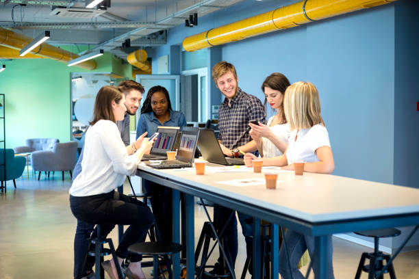 istock Young coworkers in modern office 1166660243