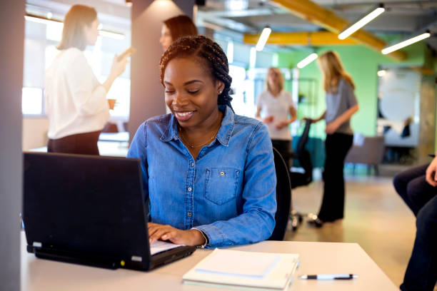 istock Young African woman in modern office 1166660397
