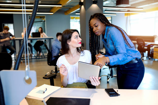 istock Young coworkers in modern office 1166660581