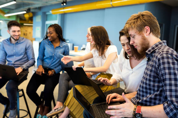 istock Young coworkers in modern office 1166660735