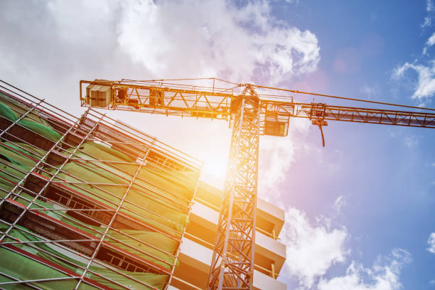 istock View large-scale construction of a residential complex with a view of construction cranes. 1166661951
