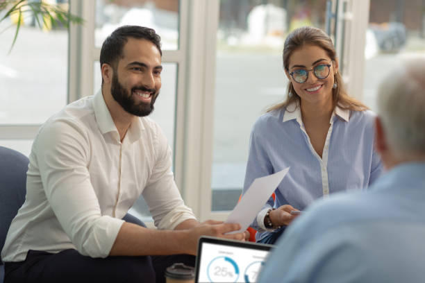 istock Joyful bearded male person presenting his business project 1166663162