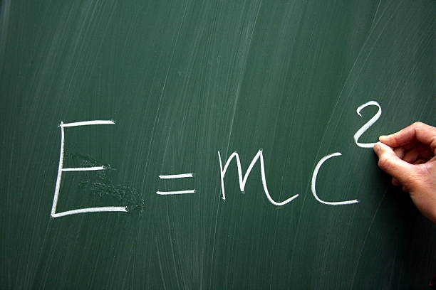 istock Einstein's formula being written on a chalkboard 116666468