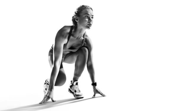 sports background. runner on the start. black and white image isolated on white. - atleta imagens e fotografias de stock