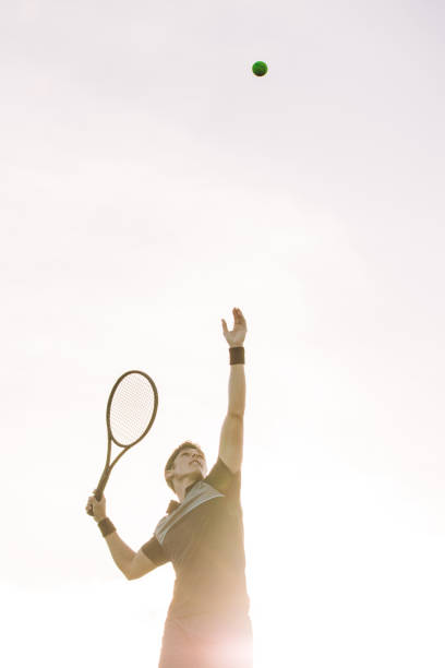 istock Tennis player serving a ball 1166668568