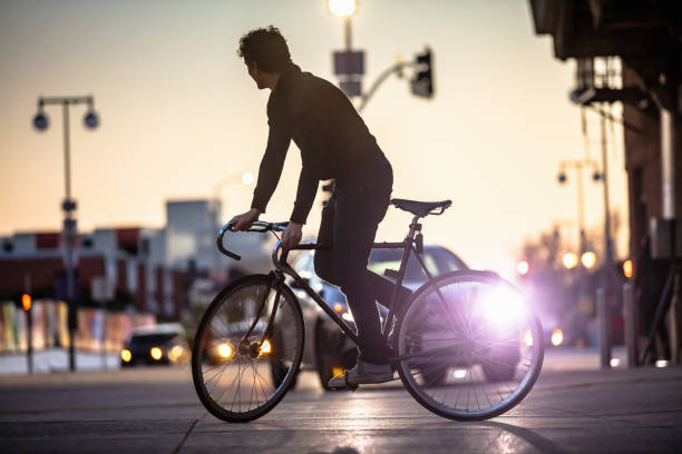 istock Urban Cyclist Looking Out for Cars 1166671041