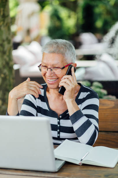 istock Senior Woman sitting in a cafe 1166671105