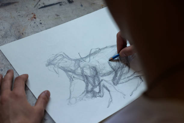 istock Young Male Artist Working On Painting 1166673501