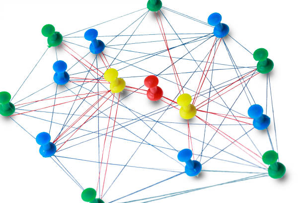 istock The colored needles are interconnected by a thread, the concept of interaction with each other, and each of them is separately connected with needles of a different color, which are separately connect 1166674356