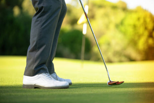 istock Professional golfer taking a tee shot on close up 1166674582