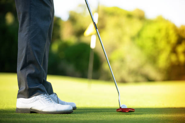 istock Professional golfer taking a tee shot on close up 1166674608