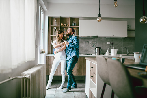 Couple Dancing In The Kitchen