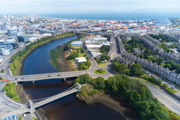 Aerial view of Aberdeen as River Dee flows to the North Sea Aberdeen, Scotland / UK - August 4th 2019: Aerial view of Aberdeen as River Dee flows to the North Sea aberdeen scotland photos stock pictures, royalty-free photos & images