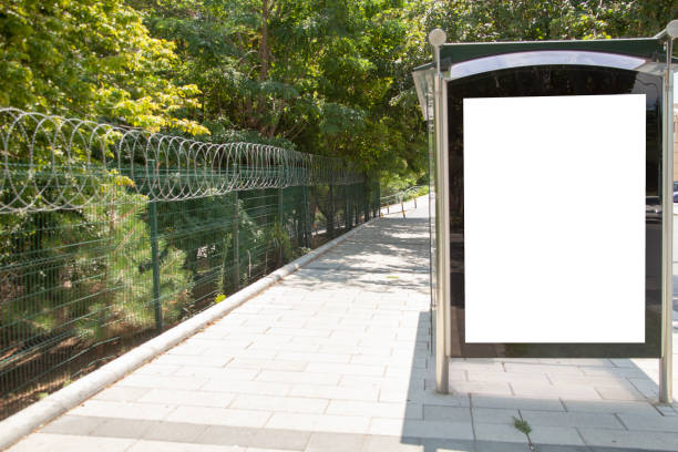 istock advertising board on asphalt road 1166681334