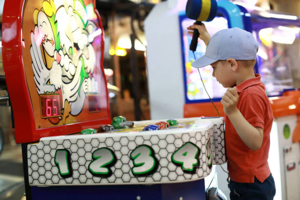istock Child playing in amusement park 1166681931