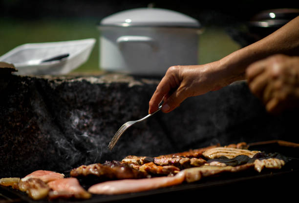 istock Grilling food on barbecue grill 1166682935