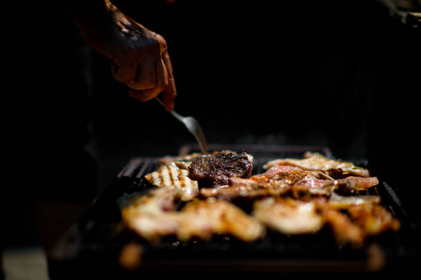 istock Grilling food on barbecue grill 1166683917