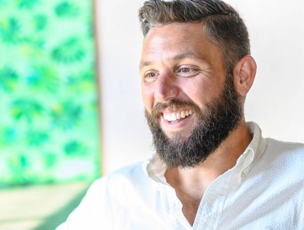 istock Handsome bearded guy in his thirties simple portrait 1166684214