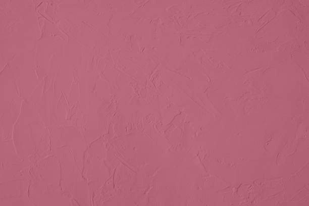 istock Dark pink colored low contrast Concrete textured background with roughness and irregularities 1166684217