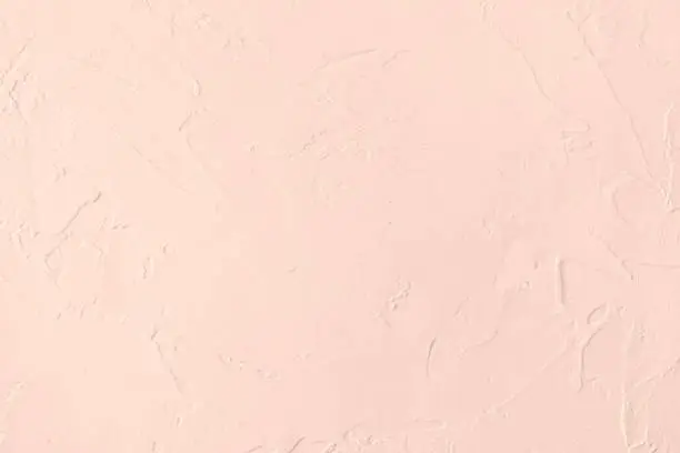 Photo of Pale pink low contrast Concrete textured background