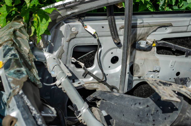istock gray car frame disassembled car among the trees 1166684302
