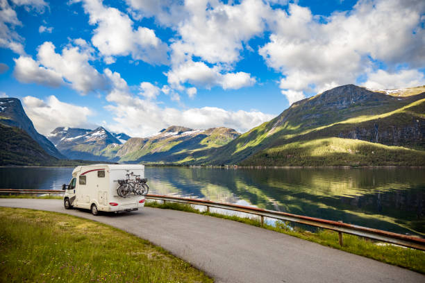 Family vacation travel RV, holiday trip in motorhome Family vacation travel RV, holiday trip in motorhome, Caravan car Vacation. Beautiful Nature Norway natural landscape. family camping stock pictures, royalty-free photos & images