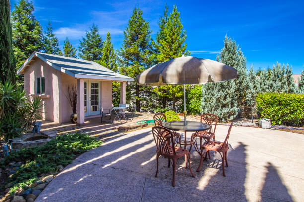 istock Pool House With Umbrella Table And Four Chairs 1166690284