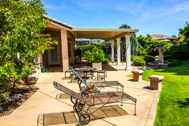 istock Lounge Chairs And Fire Pit In Rear Yard 1166691574