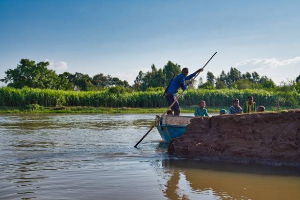 Tis Issat, Ethiopia - Feb 05, 2020: People living near the Blue Nile falls, Tis-Isat Falls, meaning great smoke in Amharic in Amara region of Ethiopia, Eastern Africa