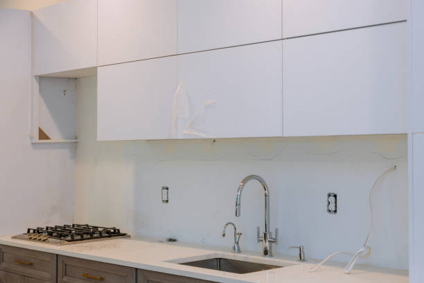 istock Custom kitchen cabinets in various stages of installation 1166700141