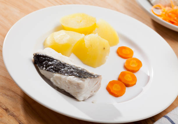 istock Steamed whiting with potato and carrots 1166704147