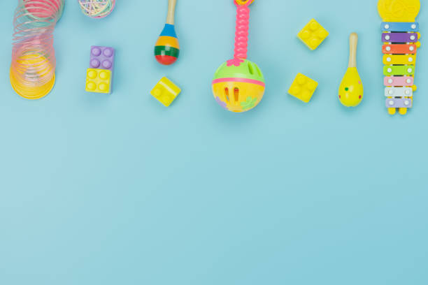 istock Table top view decoration kid toys for develop background concept.Flat lay accessories baby to play with items child on modern bule paper at office desk.Copy space for add text.pastel tone wallpaper. 1166704732