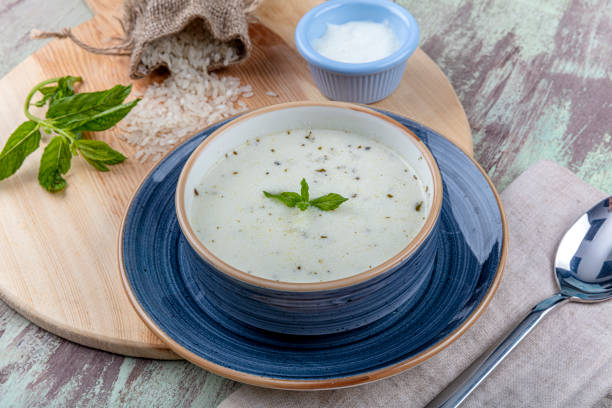 istock Traditional yayla soup (yoghurt soup) on wooden background 1166705982