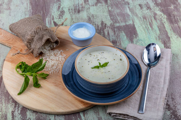 istock Traditional yayla soup (yoghurt soup) on wooden background 1166710358