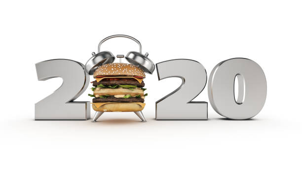 istock hamburger alarm clock concept 2020 New Year sign. 3d rendering 1166710492