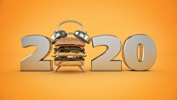 istock hamburger alarm clock concept 2020 New Year sign. 3d rendering 1166710583